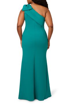 Beautiful pleats waft up into the bow-embellished shoulder of this elegant column gown accented with a flared, full-length skirt. 62" length Hidden side-zip closure One-shoulder neck Sleeveless Lined 95% polyester, 5% elastane Dry clean Imported Teal Gown, Shoulder Stretch, Full Length Skirts, Column Gown, Mermaid Gown, Stretch Crepe, Adrianna Papell, Side Zip, One Shoulder