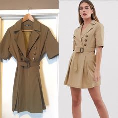 The Color I’m Selling Is Olive Green.The Same Exact Dress On The Model. Dress By Boohoo Notch Lapels Button Detail Belted Waist Regular Fit Pockets On The Side No Surprises, Just A Classic Cut New Without Tags Will Fit Medium - Large Khaki Mini Dress For Work, Summer Khaki Mini Dress For Workwear, Belted Button-up Mini Dress For Work, Summer Khaki Mini Dress For Work, Button-up Belted Mini Dress For Work, Fitted Khaki Mini Dress For Spring, Summer Workwear Khaki Mini Dress, Fitted Khaki Mini Dress For Fall, Workwear Belted Button-up Mini Dress