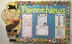 a bulletin board that has been decorated with pictures and words for parents to write on it