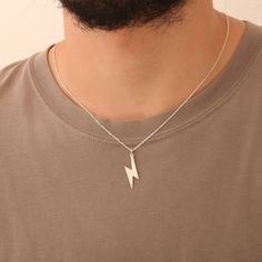 This sleek silver lightning bolt necklace is a bold symbol of power and energy ⚡. Its minimalist design makes it a versatile piece, perfect as a unique birthday or Christmas gift for him 🎁. Whether he's into nature, mythology, or simply wants a standout accessory, this thunderbolt pendant is sure to impress. High-quality silver lightning bolt pendant Symbolizes energy, power, and strength ⚡ Lightweight and comfortable for everyday wear Ideal as a birthday or Christmas gift 🎄 Minimalist design Nature Mythology, Lightning Necklace, Lightning Bolt Necklace, Christmas Gift For Him, Jewelry Minimalist, Christmas Gifts For Him, Lightning Bolt, Gold Plated Necklace, Necklace Sizes