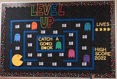 a black board with colorful graphics on it and the words level up written in large letters