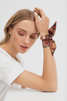 Mini silk scarves and scarf bracelets by Silk Philosophy. Statement accessories suitable for office and everyday wear. Unique gift for her. Multi-functional silk accessory. Wear it as a bracelet, ribbon in your hair, handbag charm or mini scarf or choker; perfect summer accessory #wristscarf #birthdaygift #bracelet #armcandy #ootd #silkscarf #uniquegift #scarfbracelet #bangle #summeraccessories #falloutfits #falloutfitideas #giftideas Elegant Rectangular Silk Scarf For Spring, Elegant Spring Square Silk Scarf, Luxury Silk Scarf For Summer, Chic Rectangular Silk Scarf As A Gift, Chic Rectangular Silk Scarf For Gifts, Elegant Printed Silk Scarf, Chic Formal Square Silk Scarf, Formal Chic Square Silk Scarf, Luxury Silk Scarf For Formal Occasions