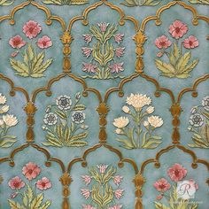 an intricately designed wallpaper with flowers and leaves on blue ground, possibly in the late 19th century