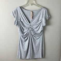 Make Me A Reasonable Offer! I Will Either Accept Or Reply With My Lowest Price! Brand New Without Tags! Never Worn! Pit To Pit: About 16” Pit To Bottom: About 18” Kept In A Smoke Free, Pet Free Home. Check Out My Other Listings And Get A Discount When You Bundle! (7) Casual Ruched V-neck Top, Casual V-neck Ruched Tops, Grey Shorts, Short Sleeve Top, Lowest Price, Short Sleeves Tops, Anthropologie, Sleeve Top, Womens Tops