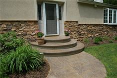 a house with steps leading up to the front door