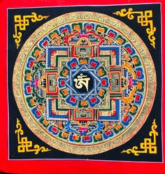 an intricately decorated wall hanging in the shape of a circle