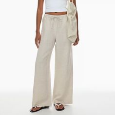 Brand New! Never Worn, Tag On. I Ordered The Wrong Size And Missed The Return Window. Color: Natural Ecru (Https://Www.Aritzia.Com/Us/En/Product/Lodge-Linen-Pant/118269005.Html) These Are High-Rise Relaxed-Fit Pants With An Elastic Waist And Drawcord. They’re Cut From Soft, Drapey Fabric Made With Linen And Tencel Lyocell Responsibly Sourced Wood-Based Fibres Produced Through A Closed-Loop System That Reduces Environmental Impact. Cream High-waisted Linen Pants, High-waisted Cream Linen Pants, Cream Wide Leg Vacation Pants, Cream Wide-leg Linen Pants, Cream Linen Wide-leg Pants, Off White Linen Wide Leg Bottoms, Cream Wide-leg Pants For Daywear, Casual Wide-leg Off White Pants, Casual Off-white Wide-leg Pants