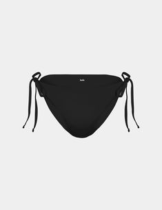 Your power suit has arrived. A classic cut with ties at the hip. Low rise with cheeky coverage. Pair it with the matching Triangle Bikini Top to complete the look. | Knix String Bikini Bottom in Black Wireless Bras, Power Suit, Wireless Bra, Active Wear Outfits, Shop Swimwear, Sports Bras, Swimwear Tops, Shapewear, String Bikinis