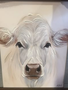 a painting of a white cow with black eyes