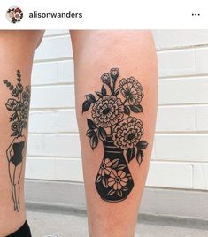 two tattoos on legs with flowers in vases