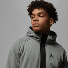 Get into it with this sleek, performance-ready hoodie. Soft fleece infused with sweat-wicking tech keeps you dry throughout your workout. When it comes to the jacket's design, everything is smooth. Taking nods from MJ's iconic track suit, concealed pockets blend into the Wings lines. Zip up, and you're ready to go.Nike Dri-FIT technology moves sweat away from your skin for quicker evaporation, helping you stay dry and comfortable.Side pockets keep your hands warm and store your stuff.More Detail Jumpman Logo, Track Suit, The Wings, Sport Man, Jacket Design, Heather Black, Full Zip Hoodie, Nike Dri Fit, Hand Warmers