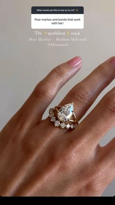 a woman's hand with a ring on it and an email message in the background