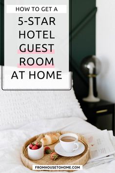 a tray with coffee and pastries on top of a bed