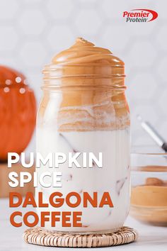 pumpkin spice dalgona coffee in a mason jar