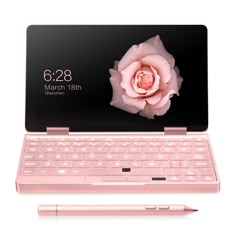 an open laptop computer with a pink flower on the screen and a pen next to it