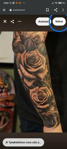 a man's arm with roses on it