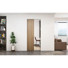 a living room filled with furniture and a book shelf