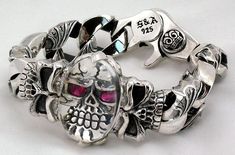 CRYSTAL RED EYE SKULL TRIBAL CUBAN STERLING SILVER BRACELET ~BRAND NEW 100% Solid sterling silver, polished. Features .925 Trademark on back of clasp. Sterling Silver Weight: 175 grams. Bracelet Width (Closed): 7/8” Inches (22.30 mm)   Large clear crystal oval cover ruby eye skull. Skilfully made and skull-fully made, Luxury Adjustable Skull Bracelets, Sterling Silver Skull Jewelry With Polished Finish, Collectible Silver Skull Jewelry, Luxury Skull Jewelry For Gifts, Luxury Skull Shaped Jewelry For Gift, Silver Bracelet With Custom Hardware, Custom Silver Handmade Bracelets, Handmade Custom Silver Bracelets, Silver Jewelry With Custom Hardware Gift