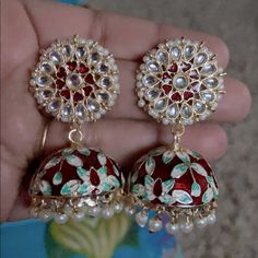 Hand Painted Jhumka Earrings. Excellent Quality. Never Worn Red Fusion Chandbalis For Celebration, Red Fusion Style Chandbalis For Diwali, Red Fusion Style Chandbalis For Celebration, Red Fusion Bridal Earrings For Festive Occasions, Red Chandbali Fusion Danglers, Red Fusion Chandbali Danglers, Heavy Red Jhumkas For Festivals, Red Fusion Style Chandbali Danglers, Red Fusion Style Festive Danglers