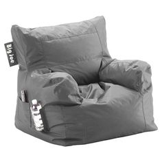 a grey bean bag chair with a remote control