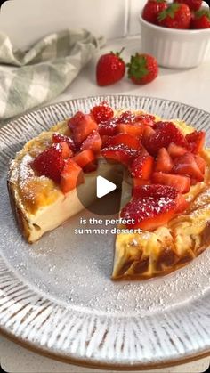 a piece of cake with strawberries on it and the words is the perfect summer dessert