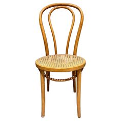 a wooden chair with wicker seat and back