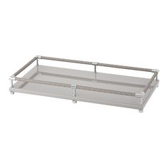 a metal tray with two handles and rope on the bottom, in front of a white background