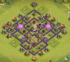 a clash base with many different items on the top and one purple ball in the middle