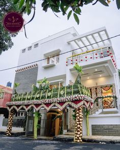 a white building with decorations on the outside