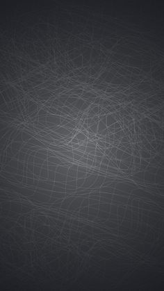 an abstract black and white background with lines in the shape of wavy shapes on dark gray paper