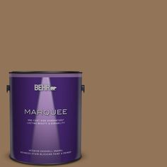 a purple paint can with the words marquee on it's bottom half