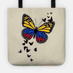 a tote bag with an image of a butterfly on it's back and flying butterflies in the air