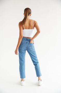 This item is excluded from promotions. Everyone needs a pair of these jeans in their closet! The Levi's Wedgie Straight Jeans are the perfect staple featuring a high rise fit, a classic button fly, and a straight leg silhouette. Top it off with a corset for a casual feminine vibe. Details 100% Cotton Levi's back leather label Belt loops Classic five pocket design Button fly closure Machine wash cold / Tumble dry medium Sizing & Fit Fits true to size Size up for a relaxed fit Model is 5'9, wearin American Threads, American Denim, Trendy Boutique, Levis Women, Leather Label, Selfie Poses, Straight Jeans, Mom Jeans, Fitness Models