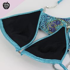 "A bright and attractive Teal Lily Designer Competition Bikini will set you apart from the crowd. Perfect tailoring will emphasize your dignity. Hard molded triangle top with push up and Scrunch brazilian cut bikini will successfully highlight your beautiful and muscular body. Undoubtedly this Designer Bikini will only complement your Competition look. Surprise the judges with your Bright and Elegant Bikini Suit! ❤ Fully lined ❤ Hard molded triangle top with push up ❤ Beautiful sparkle appearanc Blue Beachwear Party Set, Turquoise Triangle Top Swimwear For Party, Party Mermaid Fitted Swimwear, Competition Jewelry, Holographic Fabric, Posing Suits, Fitness Competition, Brazilian Cut, Floral Designer