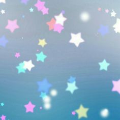 colorful stars flying in the sky on a blue background