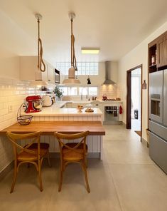 the kitchen is clean and ready to be used as a dining room or family room