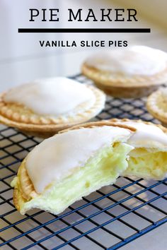 three pastries sitting on top of a cooling rack next to each other and one has a bite taken out of it