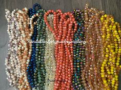 a bunch of beaded necklaces on a wooden floor with the words rondeles over them