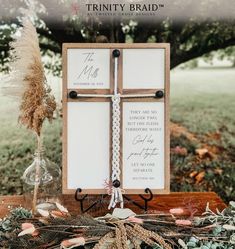 a wooden cross sitting on top of a table