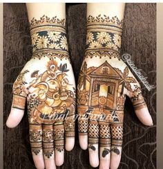 two hands with henna designs on them