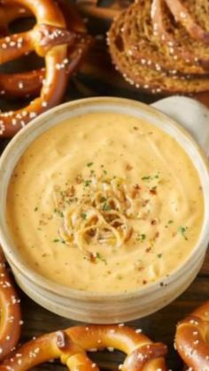 pretzels and dip in a bowl on a table