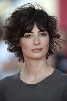 15. Short, Curly Hair with Side Bangs - Hairstyles For Women Over 40 With Bangs - Hairstyles For Women Over 40 With Bangs Short Curly Shag Hairstyles, Curly Hair With Side Bangs, 40 With Bangs, Short Wavy Hair With Bangs, Short Brown Curly Hair, Classic Long Bob, Hair With Side Bangs, Hair Color For Brown Skin, Older Women's Hairstyles