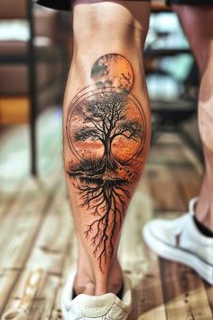 a person with a tree tattoo on their leg