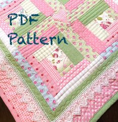 a pink and green patchwork quilt with the words pdf pattern written on it