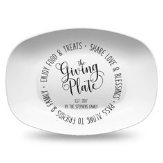 a white plate with the words black and white farm script on it, along with an oval