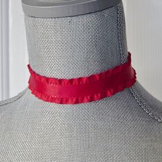 "This Christmas red choker necklace is made up in a lovely red satin ribbon with a ruffle edge. The ribbon is crimped with antique brass clasps. There is a matching antique brass extension chain linked on the clasps for adjustable length and a lobster claw closure. Chain is accented with an antique gold dangle bead. The length of the main lace on the choker is 12\" and with the extension chain, overall length is 15\" Customization is available for length or metal accents. Let me know any special Red Choker For Valentine's Day Gift, Vintage Red Choker For Party, Red Choker For Valentine's Day, Red Choker Necklace, Ribbon Choker Necklace, Red Choker, Ribbon Choker, Earring Storage, Earring Organizer