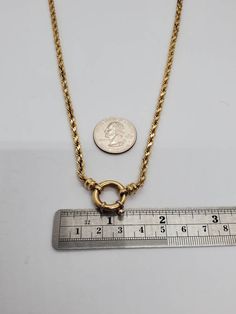 Gorgeous Estate 3.5 mm Rope Chain Necklace With Very Large Sailor Clasp This is a beautiful 1980s necklace it weighs approximately 21.3 G and it's an amazing condition considering its age it measures approximately 20 1/4 in length The necklace is marked 14k T Italy and has been tested to be 14 karat gold Please reach Blair at 404-552-4535 if you have any questions regarding this item prior to purchasing Gold Snake Chain Necklace For Anniversary, Yellow Gold Metal Jewelry With Wheat Chain, Vintage Yellow Gold Necklace With Spring Ring Clasp, Vintage Gold Necklace With Spring Ring Clasp, Vintage Gold Round Toggle Necklace, Vintage Round Box Chain Necklace, Vintage Yellow Gold Rope Chain Necklace, Yellow Gold Toggle Necklace With Round Gold Chain, Metal Chain Necklace With Lobster Clasp For Anniversary