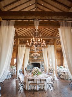 an instagram page with a table and chairs in front of a chandelier