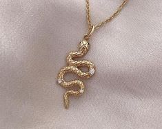 Twin Snakes necklace '' Ofis '' handmade | Etsy Adjustable Gold Snake-shaped Jewelry, Snake Shape Necklace With Adjustable Chain, Adjustable Snake Chain Jewelry With Charms, Gold Snake-shaped 14k Gold Necklace, Adjustable Gold Necklace With Jewels, Gold Snake Shape 14k Gold Necklace, Gold Adjustable Necklace With Jewels, Gold Charm Choker Jewelry, Gold Plated Snake-shaped Jewelry With Adjustable Chain