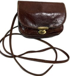 Brown Satchel Phone Bag, Classic Travel Satchel Phone Bag, Classic Satchel Phone Bag For Travel, Classic Phone Bag Satchel With Cell Phone Pocket, Classic Satchel Phone Bag With Cell Phone Pocket, Elegant Brown Satchel Phone Bag, Formal Brown Shoulder Bag With Cell Phone Pocket, Classic Brown Phone Bag With Removable Pouch, Classic Satchel Mobile Phone Bag